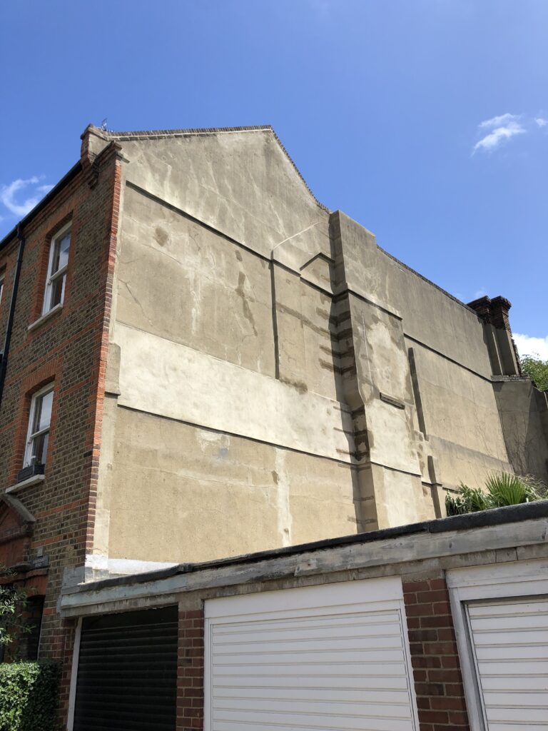 the side of a house that has recently completed a lot of structural repair works