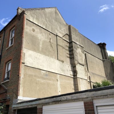 the side of a house that has recently completed a lot of structural repair works