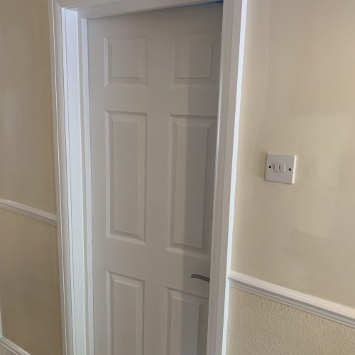 a hallway with new fire door installed